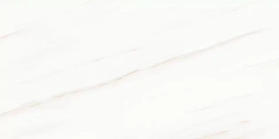 Laminam Bianco Lasa: Close-up of a white marble-look tile with subtle veining.