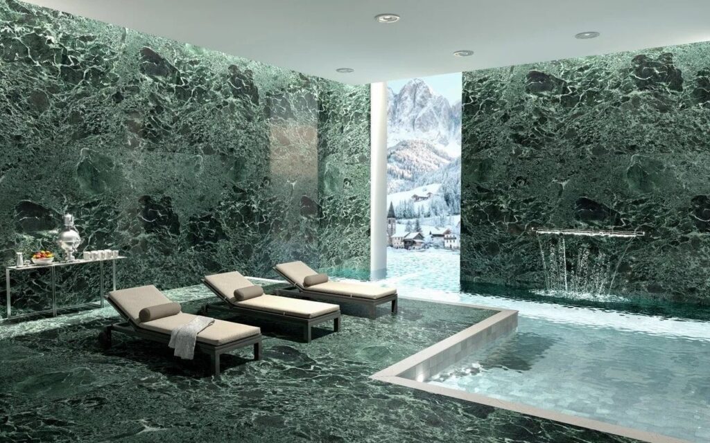 Verde Alpi deep green marble-like Laminam surface with white veining, Bookmatched ceramic slab by Laminam for luxury interiors