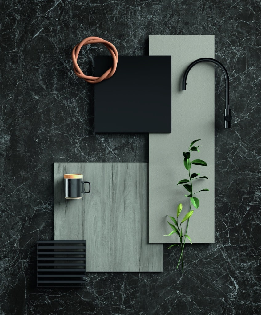 Nero Greco Laminam I Naturali moodboard näidismust, kus tumedat marmoriimitatsiooni taustal on hallide ja mustade paneelide ning rohelise taimega moodulid, lisandiks must keermestatud köögikauss ja puidust toonid