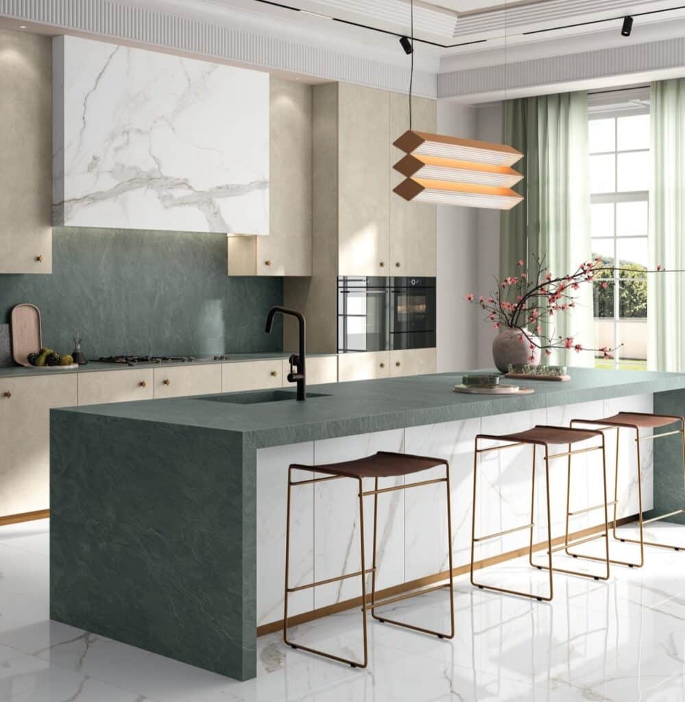 Laminam Amazzonia by Marmi Futerno, green toned ceramic surface with subtle texture and rainforest-inspired character across a kitchen countertop and wall panels.