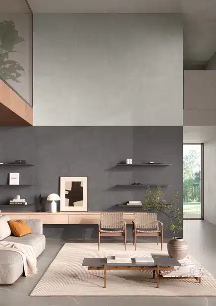 Burgundy tooniga Laminam Burgundy valdkonna jumestatud kaasaegne elutuba: tumehall seina ja hele puidust aksentidega, ruumikasutus on klaas- ja siseruumi details, burgundia varjundid esindatud ning õhulisus rõhutab kontseptuaalset elegantset stiili