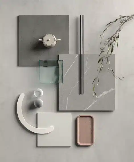 Laminam Calce Bianco plaatide kompositsioon hallide ja valgete toonidega, marmormusterile viidatakse, lisanduvad läbipaistvad ja roostevabast terasest detailid ning dekoratiivsed elemendid.