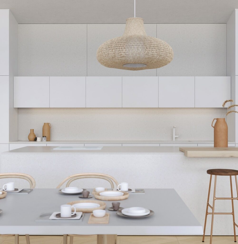 Technistone Noble Quartzite in a bright kitchen with soft white to light grey engineered quartz surfaces and a subtle quartzite-like pattern.