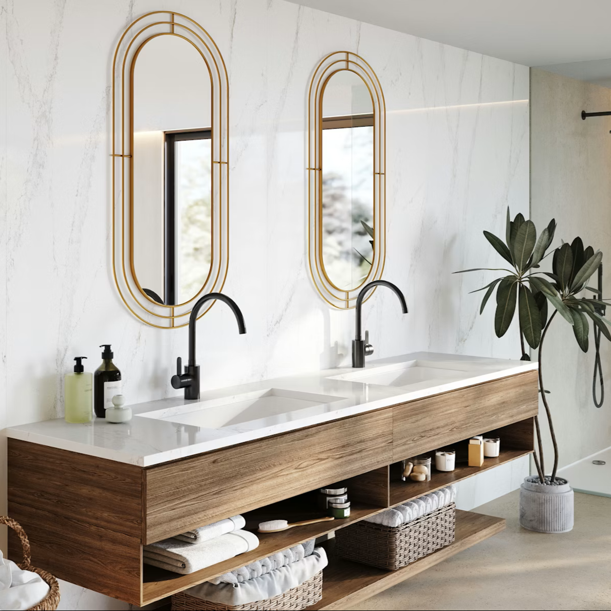 Modern bathroom vanity with Silestone Bronze Rivers countertop, double sinks, and gold oval mirrors.