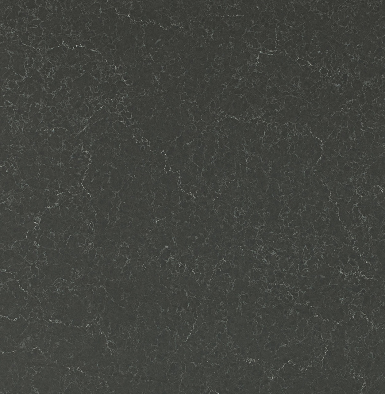 Caesarstone 5003 Piatra Grey granite countertop texture close-up