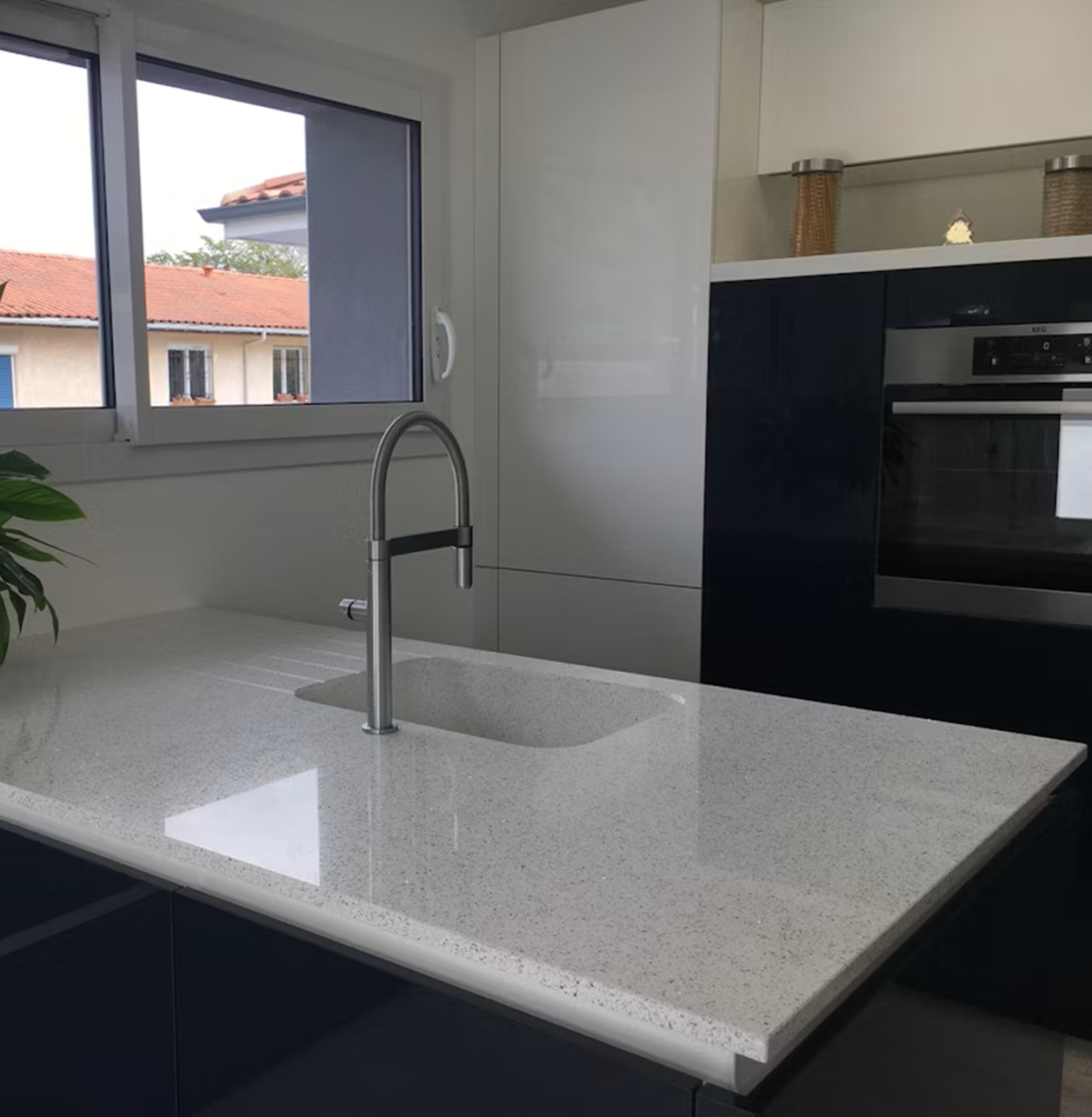 Silestone Stellar Blanco countertop with integrated sink and modern kitchen cabinets