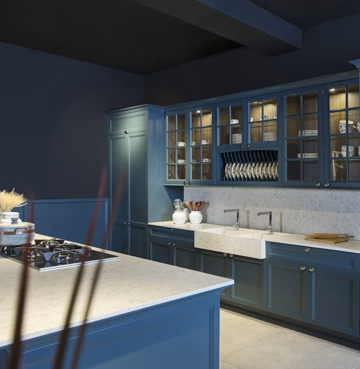 Modern blue kitchen with Silestone Lyra countertop and farmhouse sink.