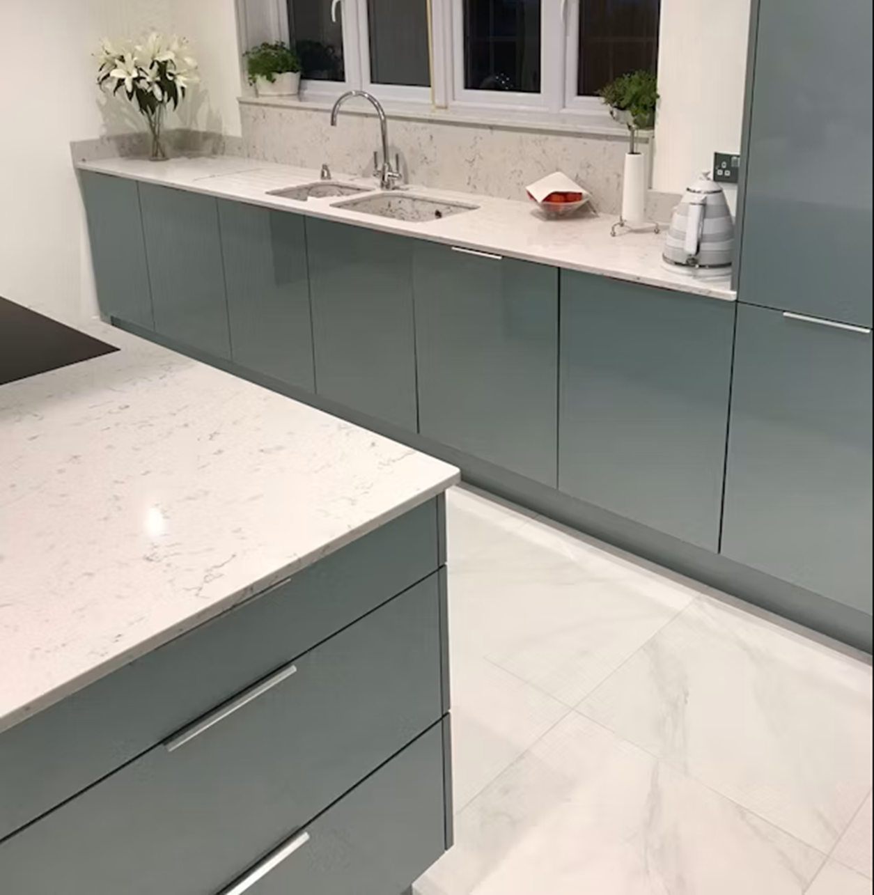 Silestone Lyra countertops in a modern kitchen with sleek grey cabinetry.