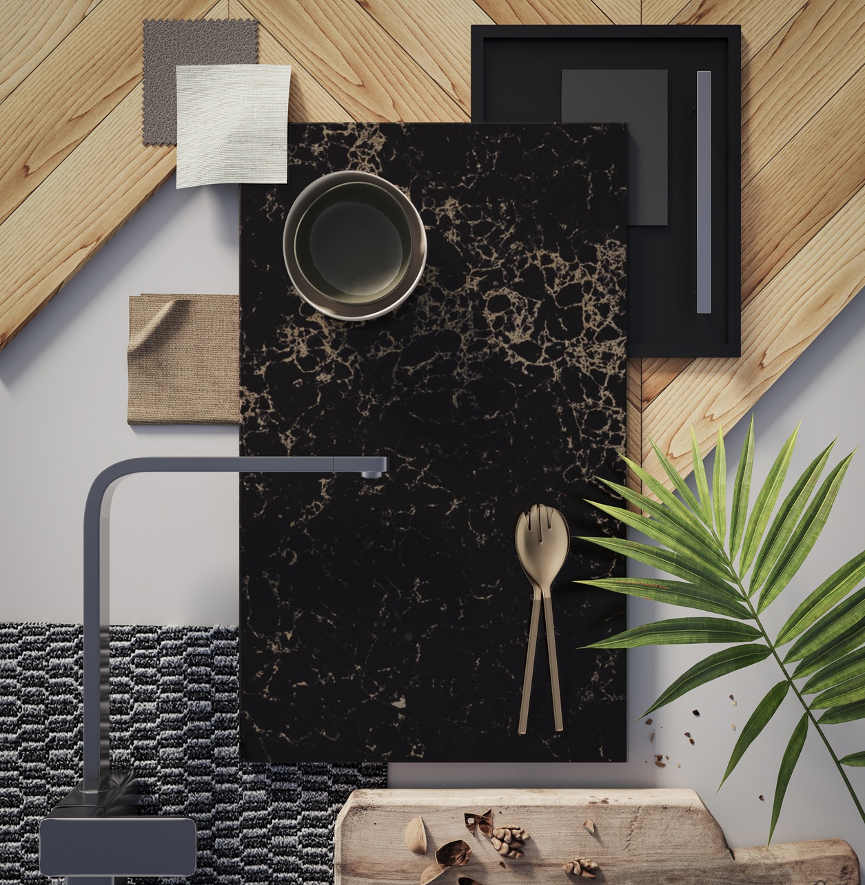 Dark marble countertop sample with gold veining, brass cutlery, and green palm leaf