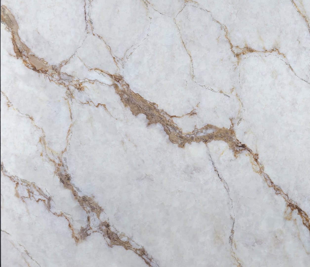 Marmi Futerno creates custom-made worktops and bespoke stone solutions using Avant Quartz 5750 Calacatta Chery quartz for residential and commercial interiors.