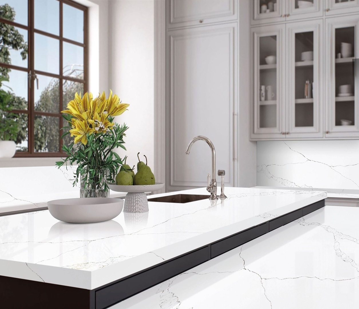 Avant Quartz 7000 Calacatta Eno countertop with pears and yellow lilies