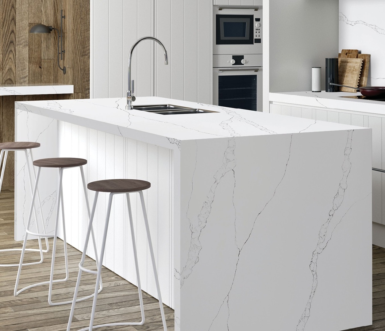 Avant Quartz 7000 Calacatta Eno kitchen island with white stools and sink
