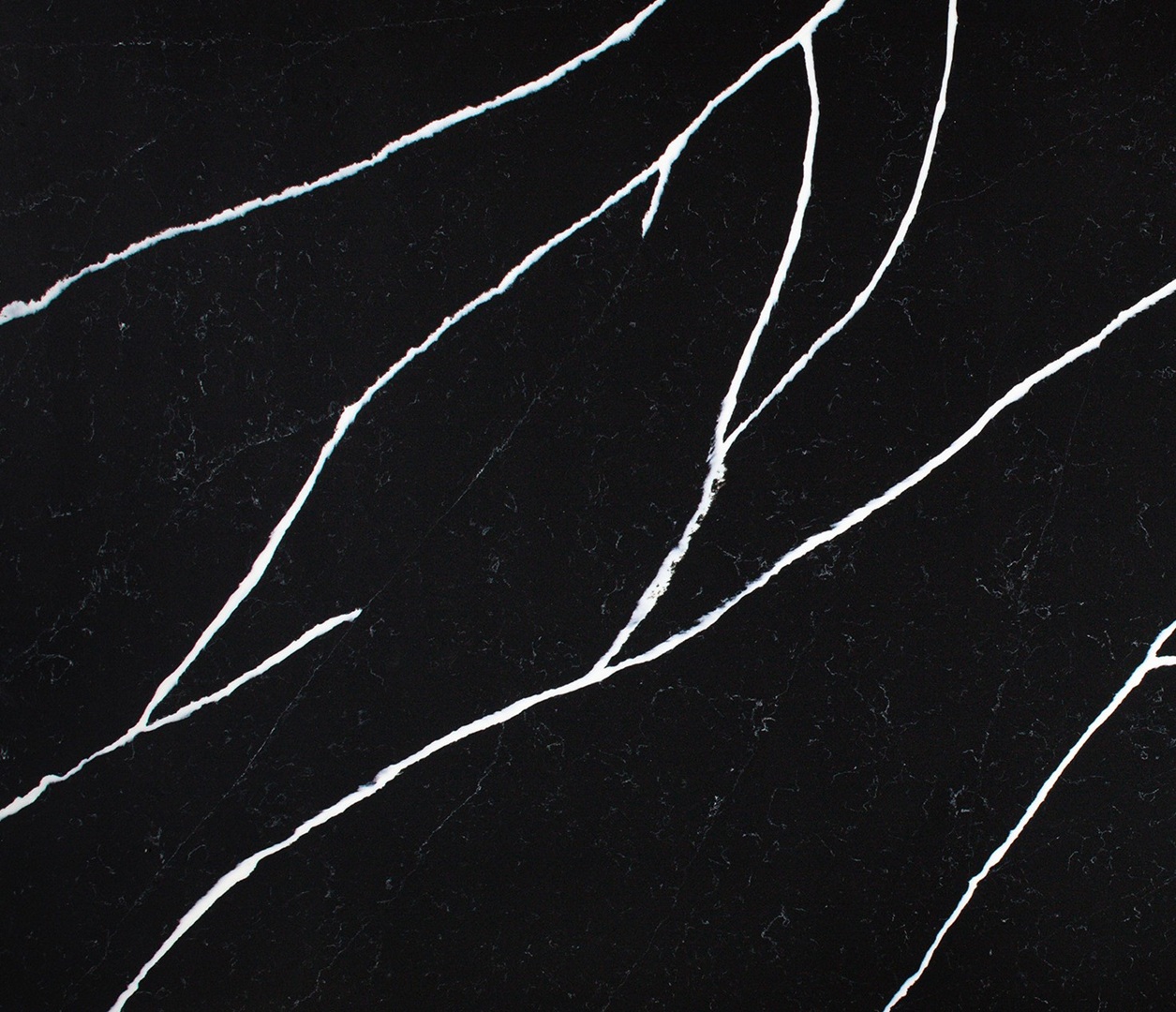 Avant Quartz 7530L Calacatta Noir Satin countertop with dramatic white veining