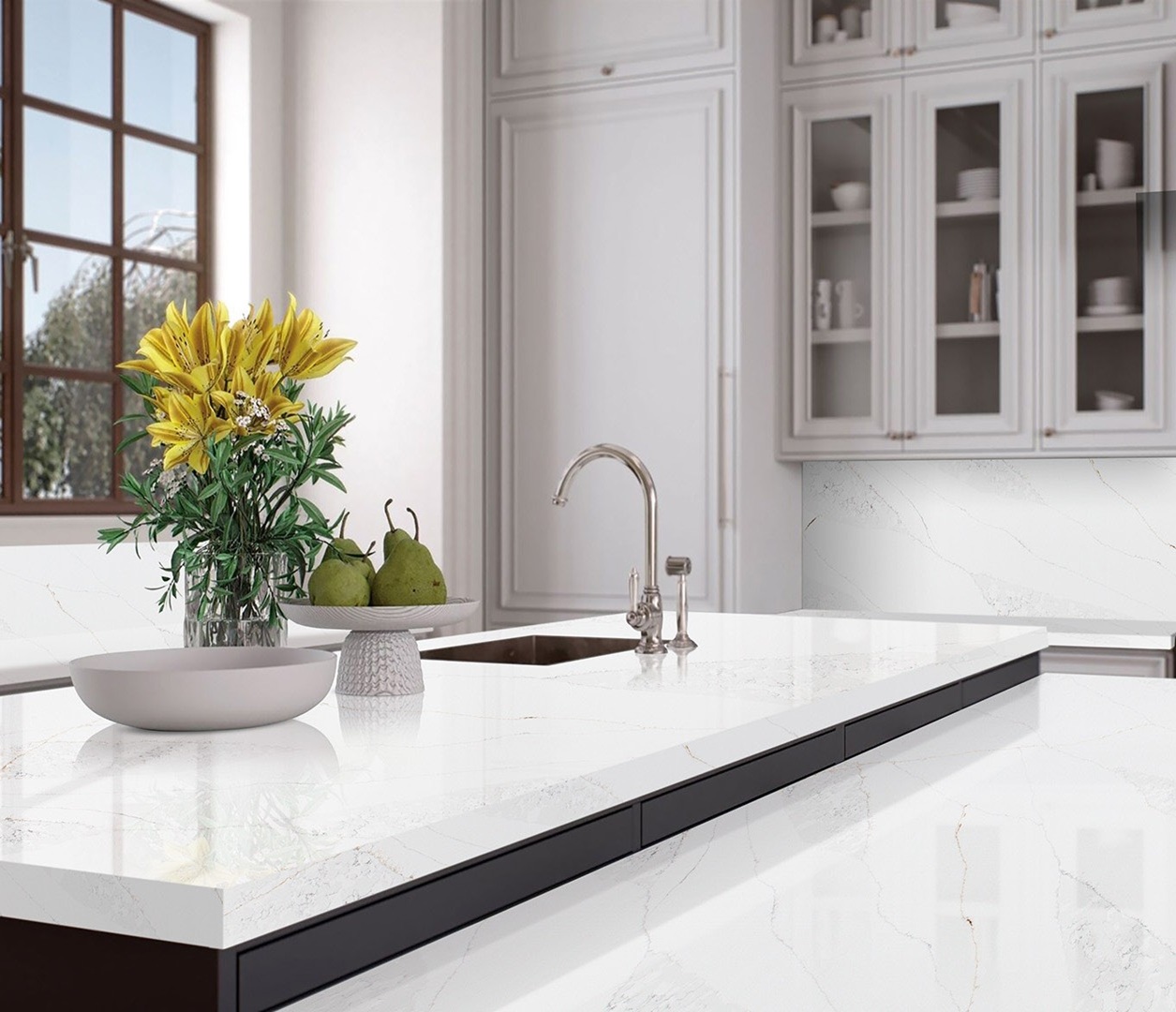 Avant Quartz 7570 Calacatta Monaco countertop with fruit bowl and lilies