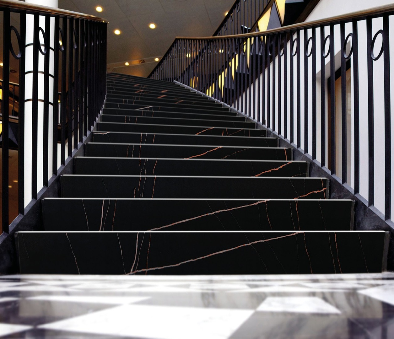 Avant Quartz 7700 Calacatta Marseille stairs with black railing