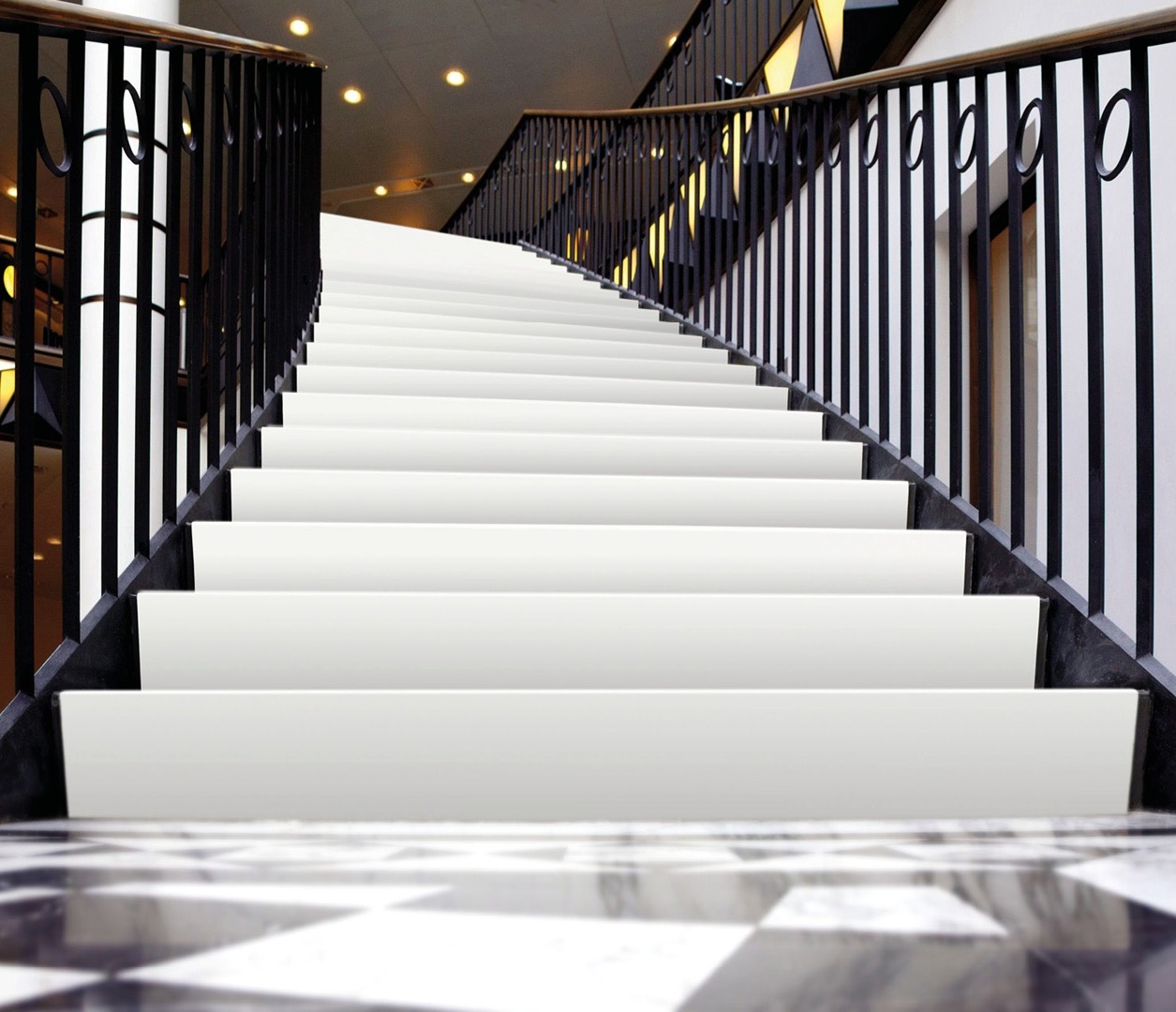 Avant Quartz 1001 Blanche stairs with black railing and marble floor